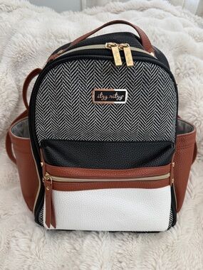 Itzy Ritzy Black, White & Brown Convertible Herringbone Backpack